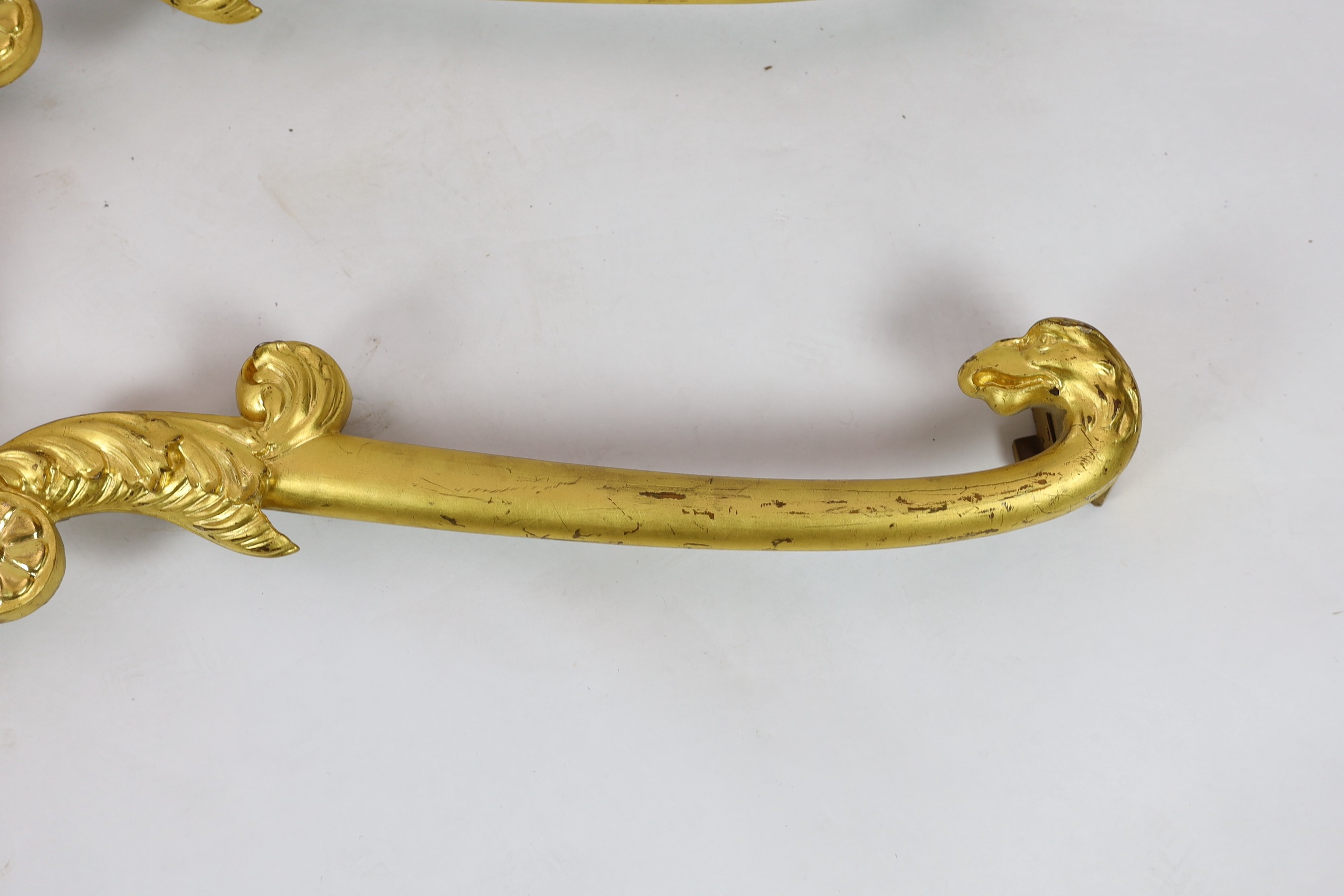 A pair of mid 19th century giltwood pediments, W.180cm H.30cm